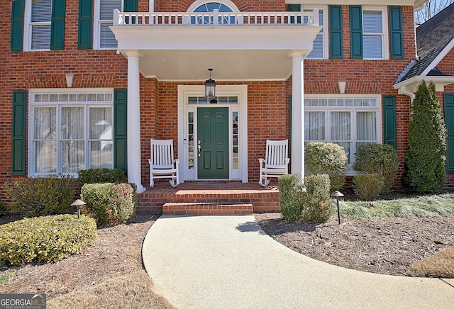 entrance to property with brick siding