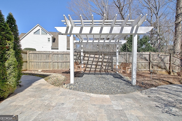 view of patio featuring a fenced backyard and a pergola