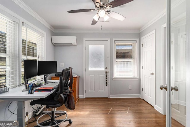 home office featuring baseboards, ceiling fan, ornamental molding, wood finished floors, and a wall mounted AC