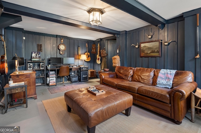 living area with beamed ceiling