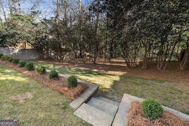 view of yard featuring fence