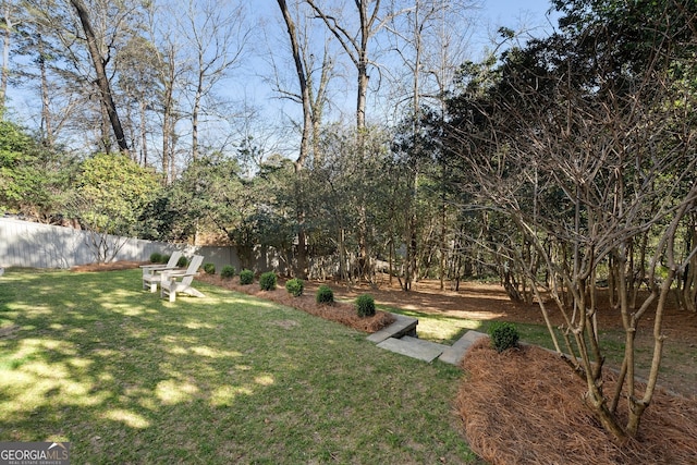 view of yard featuring fence