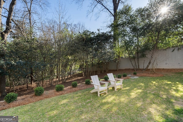 view of yard featuring fence