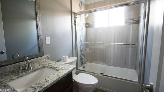 4681 City View Dr, Forest Park, GA 30297 - full bathroom with shower / bath combination with glass door, vanity, and toilet