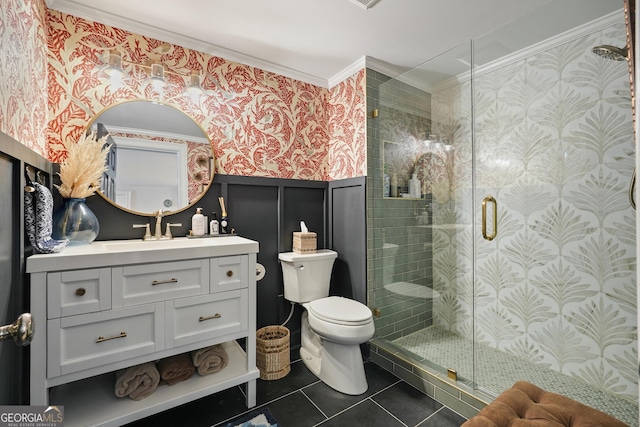 full bath featuring toilet, ornamental molding, wainscoting, a shower stall, and wallpapered walls