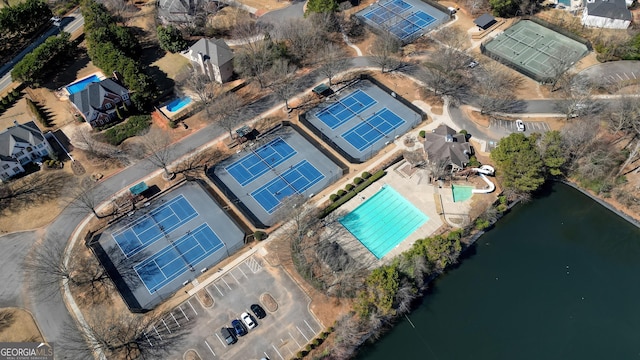 birds eye view of property featuring a water view