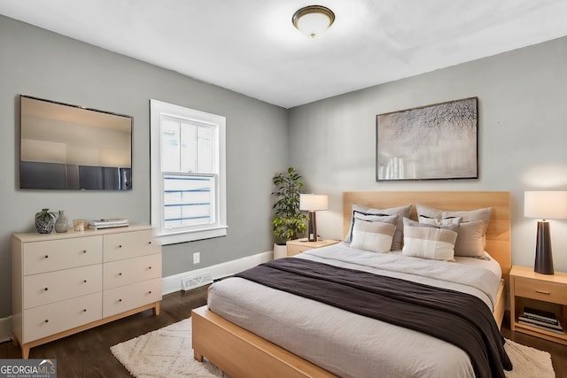 2006 Conrad Ave SE, Atlanta, GA 30315 - bedroom with wood finished floors, baseboards, and visible vents