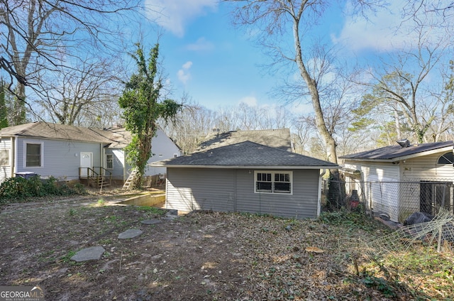 2006 Conrad Ave SE, Atlanta, GA 30315 - rear view of house with an outdoor structure and fence