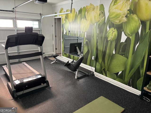 exercise room featuring a garage