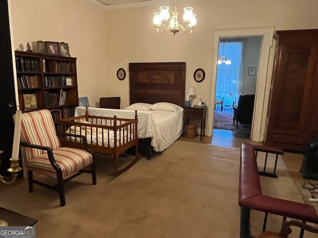 bedroom featuring carpet floors and an inviting chandelier