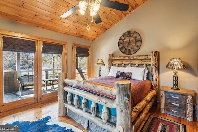 bedroom with lofted ceiling, ceiling fan, wood finished floors, access to outside, and wooden ceiling