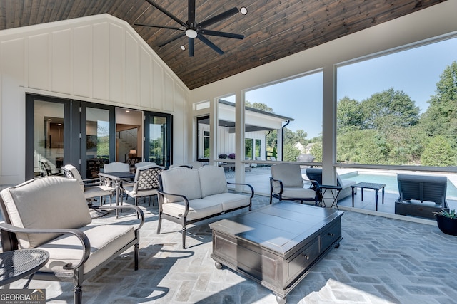 view of patio featuring an outdoor hangout area and a ceiling fan