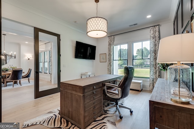 office space featuring french doors, recessed lighting, visible vents, ornamental molding, and light wood-type flooring