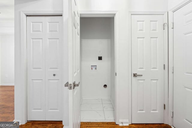 clothes washing area with washer hookup, marble finish floor, hookup for an electric dryer, laundry area, and baseboards