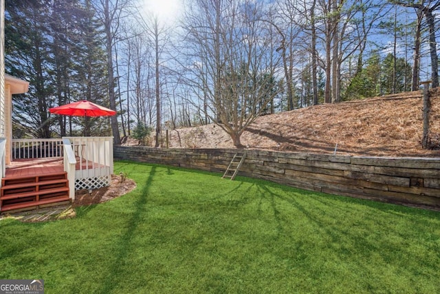 view of yard featuring a deck