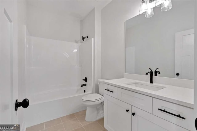 bathroom with toilet, bathing tub / shower combination, vanity, and tile patterned floors