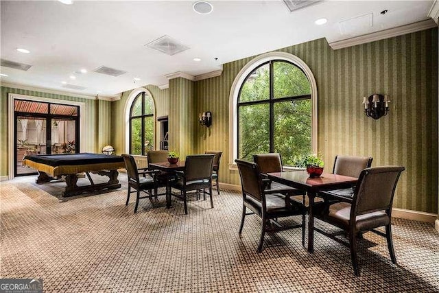 game room with carpet, visible vents, crown molding, and wallpapered walls