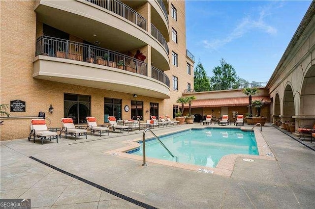 pool with a patio