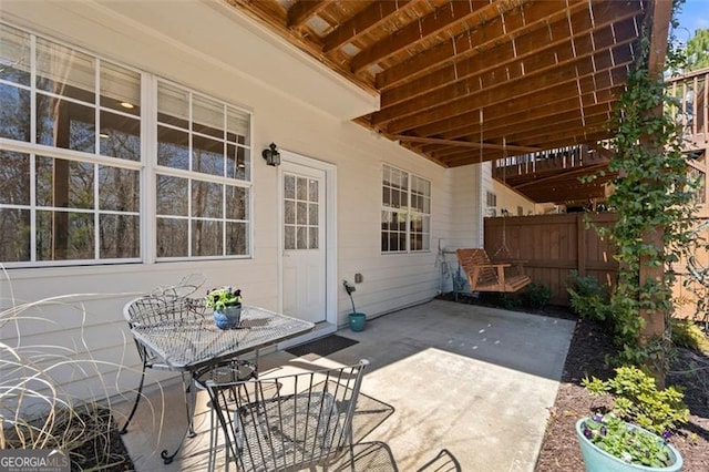 view of patio / terrace with fence