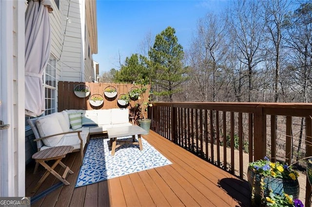 deck with outdoor lounge area