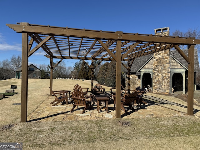 view of patio / terrace featuring a pergola