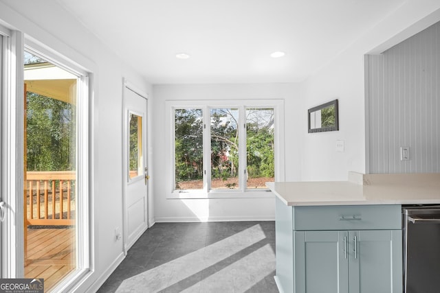 entryway featuring recessed lighting and baseboards