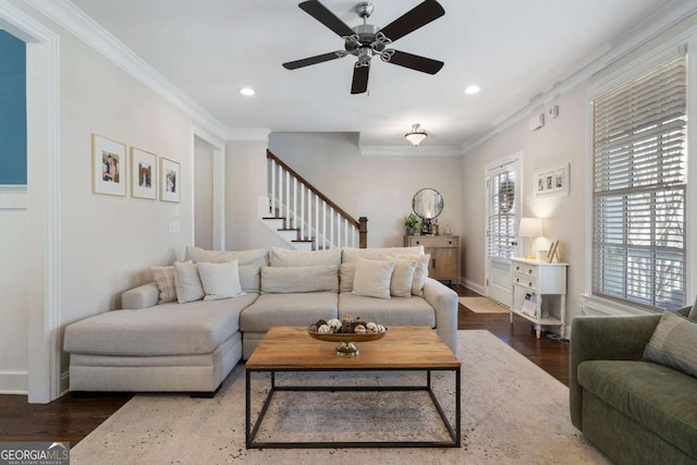 living room with stairs, recessed lighting, wood finished floors, and crown molding