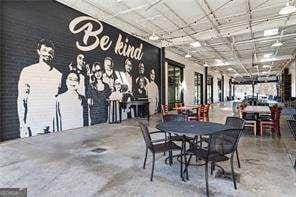 unfurnished dining area with concrete flooring