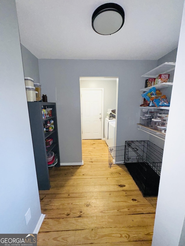 storage area with independent washer and dryer