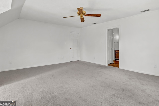 interior space with carpet floors, baseboards, and visible vents