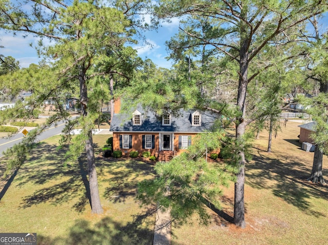 view of new england style home