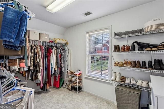 spacious closet with carpet floors and visible vents