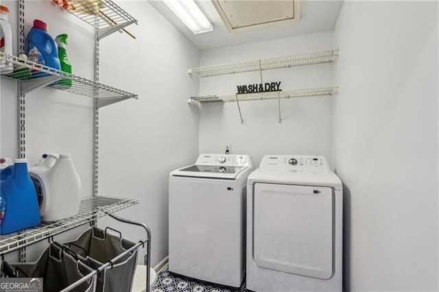 clothes washing area with laundry area and separate washer and dryer