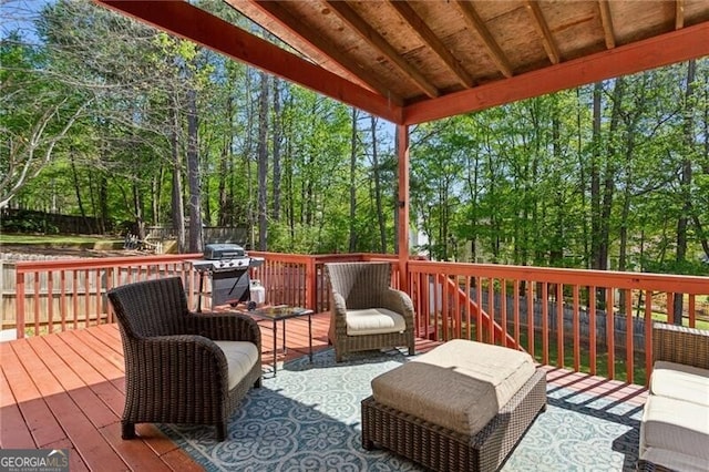 wooden terrace with area for grilling