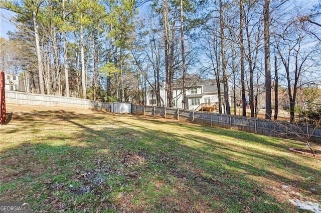 view of yard featuring a fenced backyard