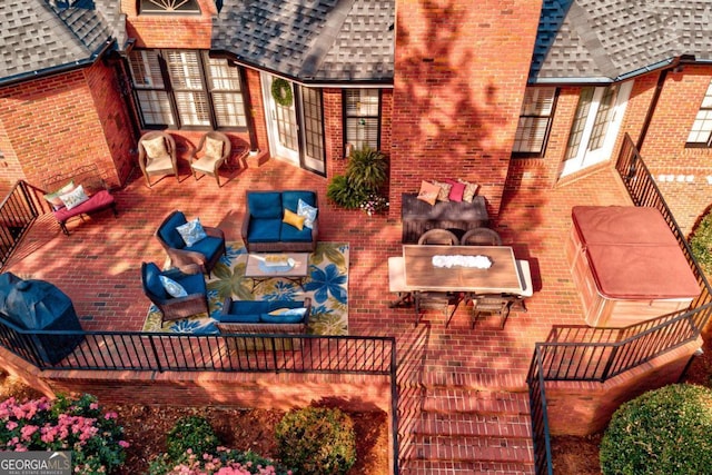 exterior space featuring french doors and an outdoor hangout area