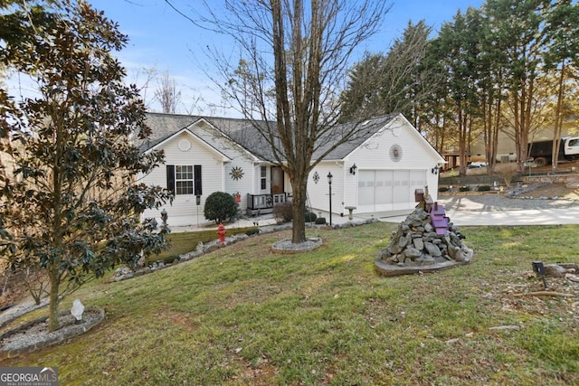 single story home with a garage, a front lawn, and concrete driveway