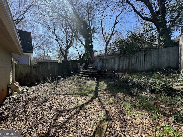 view of yard featuring a fenced backyard