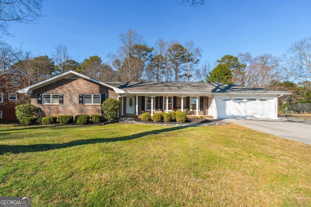 ranch-style house featuring a garage, brick siding, driveway, and a front lawn