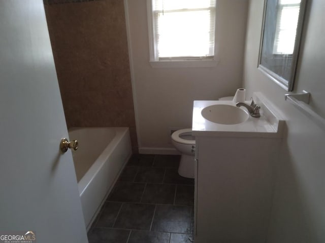 full bathroom with a tub, a wealth of natural light, vanity, and toilet