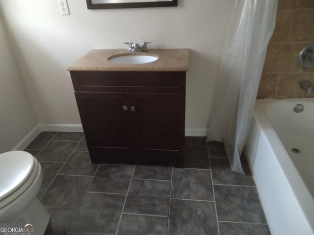 bathroom with tile patterned flooring, toilet, vanity, baseboards, and shower / tub combo with curtain