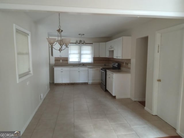 kitchen featuring decorative backsplash, white dishwasher, a sink, and stainless steel electric stove