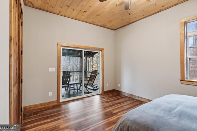 bedroom with wood ceiling, ceiling fan, wood finished floors, access to outside, and baseboards