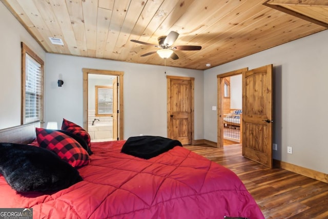 bedroom with wooden ceiling, baseboards, and wood finished floors