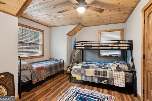 bedroom featuring wooden ceiling, visible vents, ceiling fan, and wood finished floors