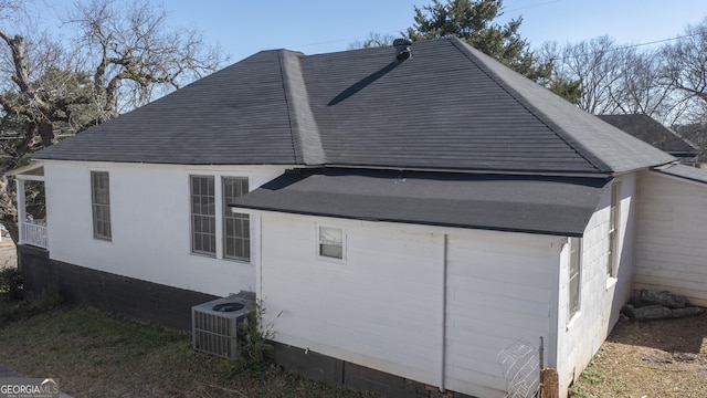 view of home's exterior with central air condition unit