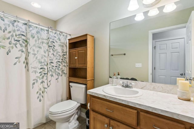 full bathroom with a shower with curtain, vanity, toilet, and tile patterned floors