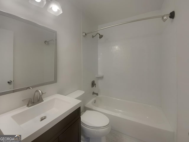 full bath featuring tub / shower combination, vanity, and toilet