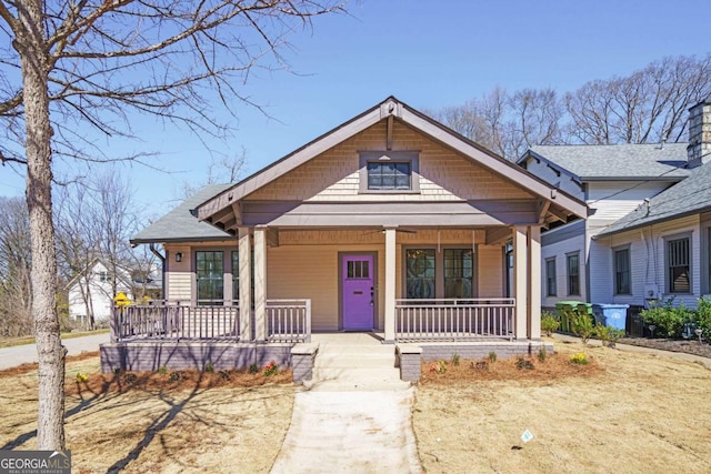 bungalow-style home featuring covered porch