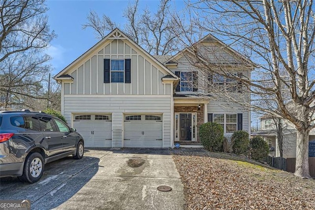 view of front of house with a garage, driveway, and board and batten siding